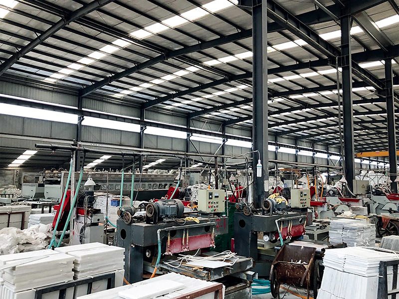 A machinery hall with stacked slabs