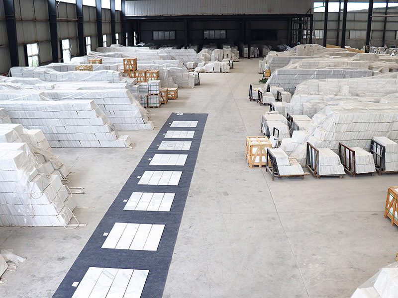 Stacks of tiles and crates in the warehouse
